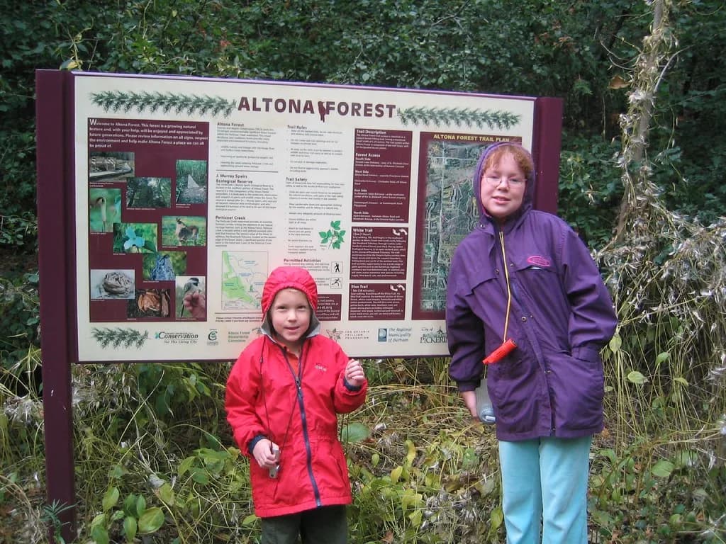 Visitors beside the Altona Forest trail kiosk, 2006.